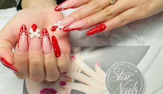 Weihnachtsnägel Rot Weiß mit Schleife – professionelle Nageldesigns bei Star Nails Nagelstudio Südstadtring 90 Halle
